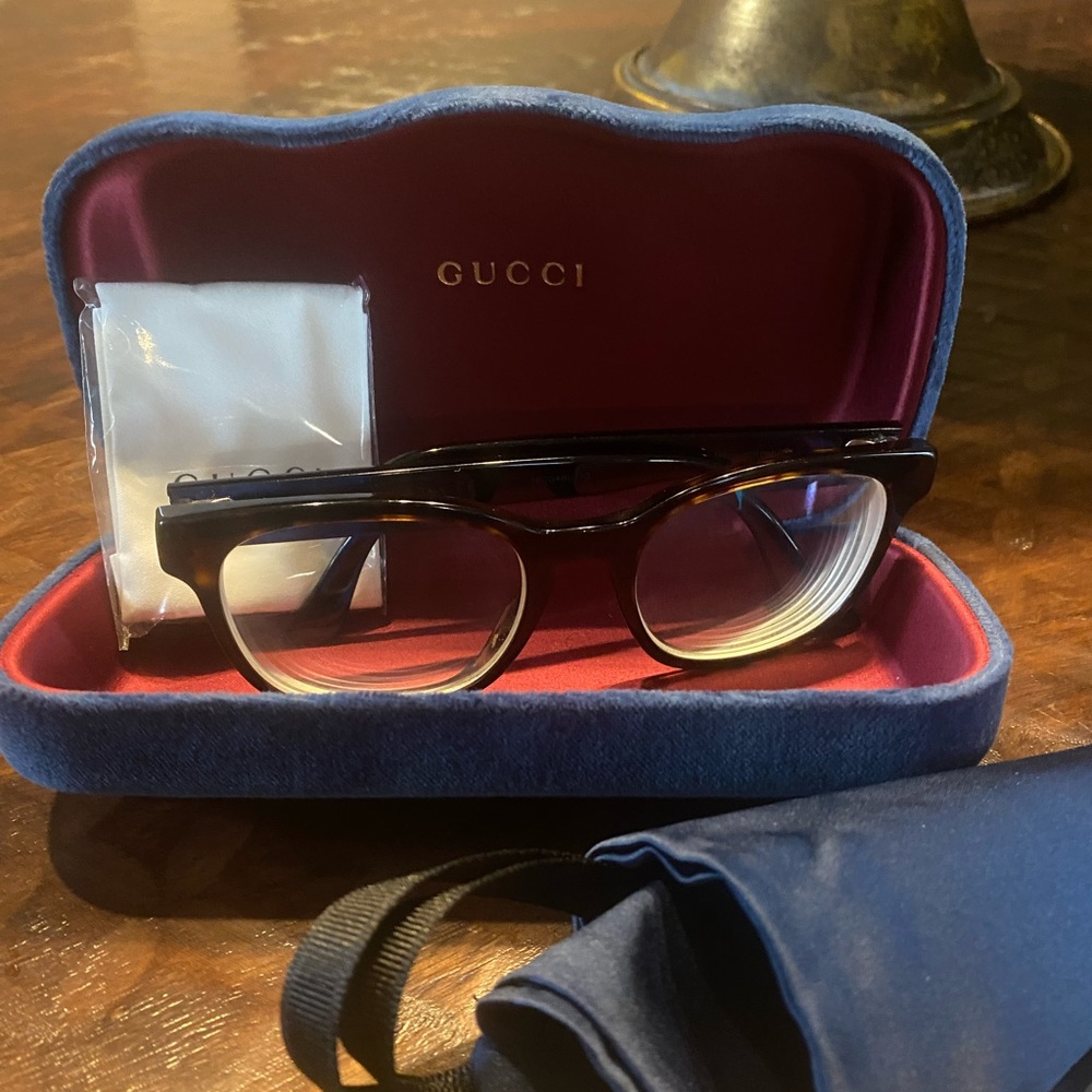 Gucci Eyeglasses and case.